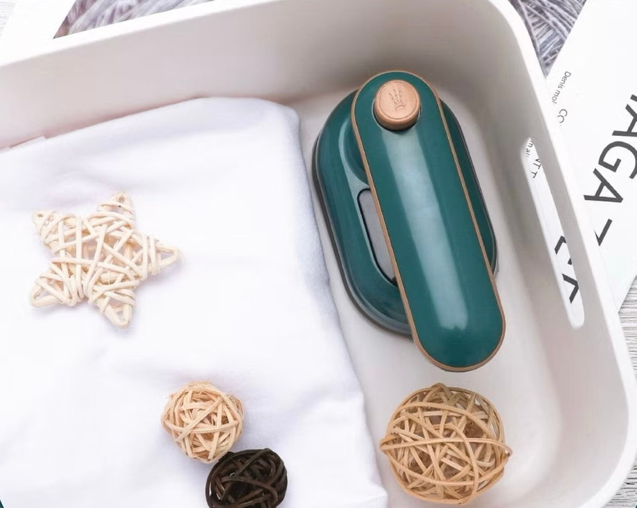 SteamGo™ - Portable Garment Steamer